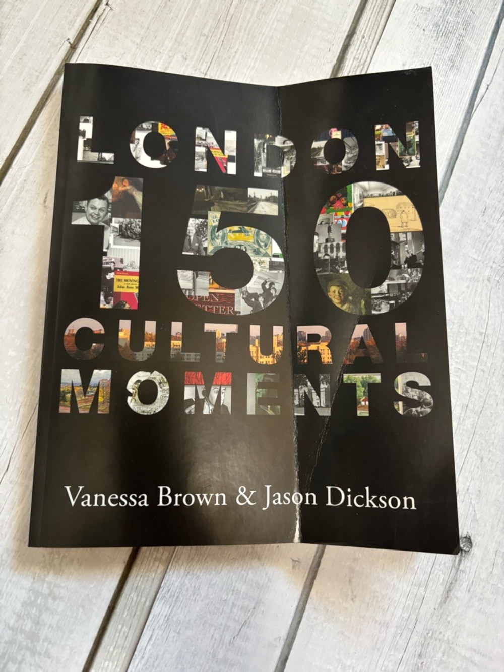 London 150 Cultural Moments Paperback — Black Cover with Photo-Collage Text